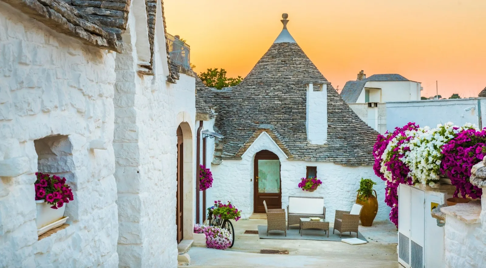 A trullo doorway in warm evening light