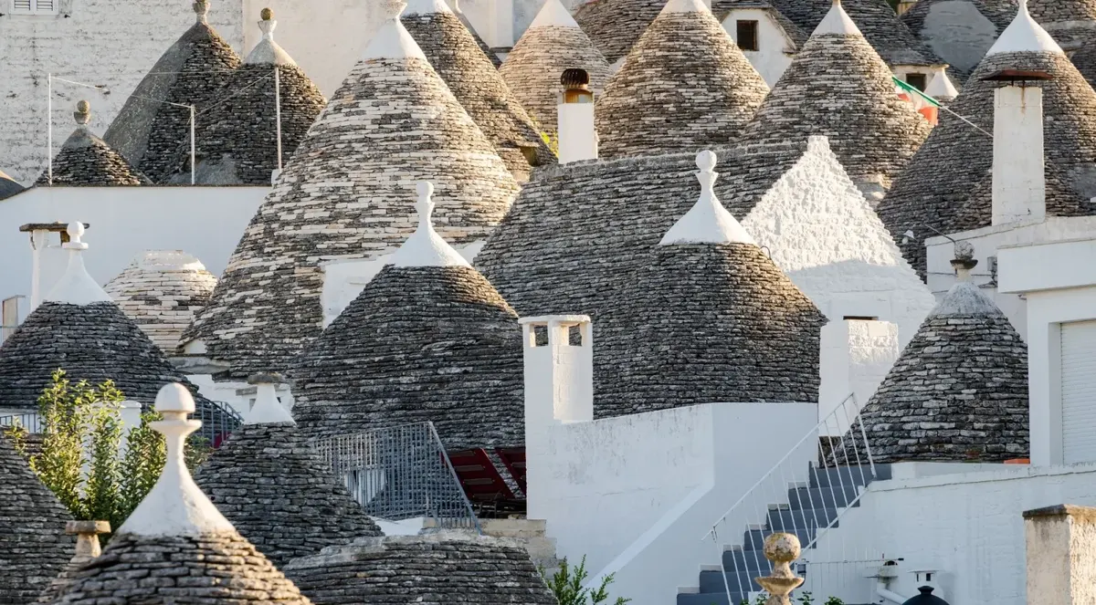 Close view of clustered conical stone roofs
