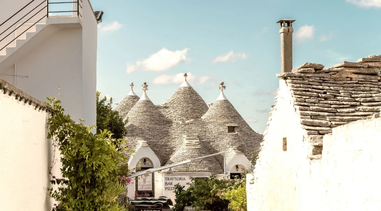 Whitewashed walls and clustered stone roofs