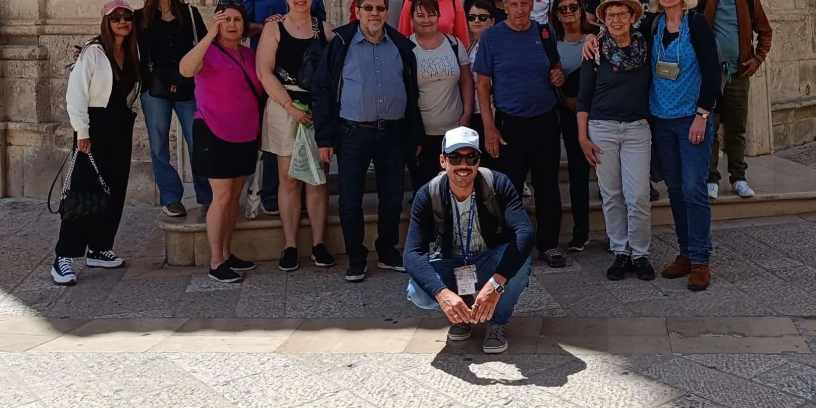 Visitors gathered around a local guide