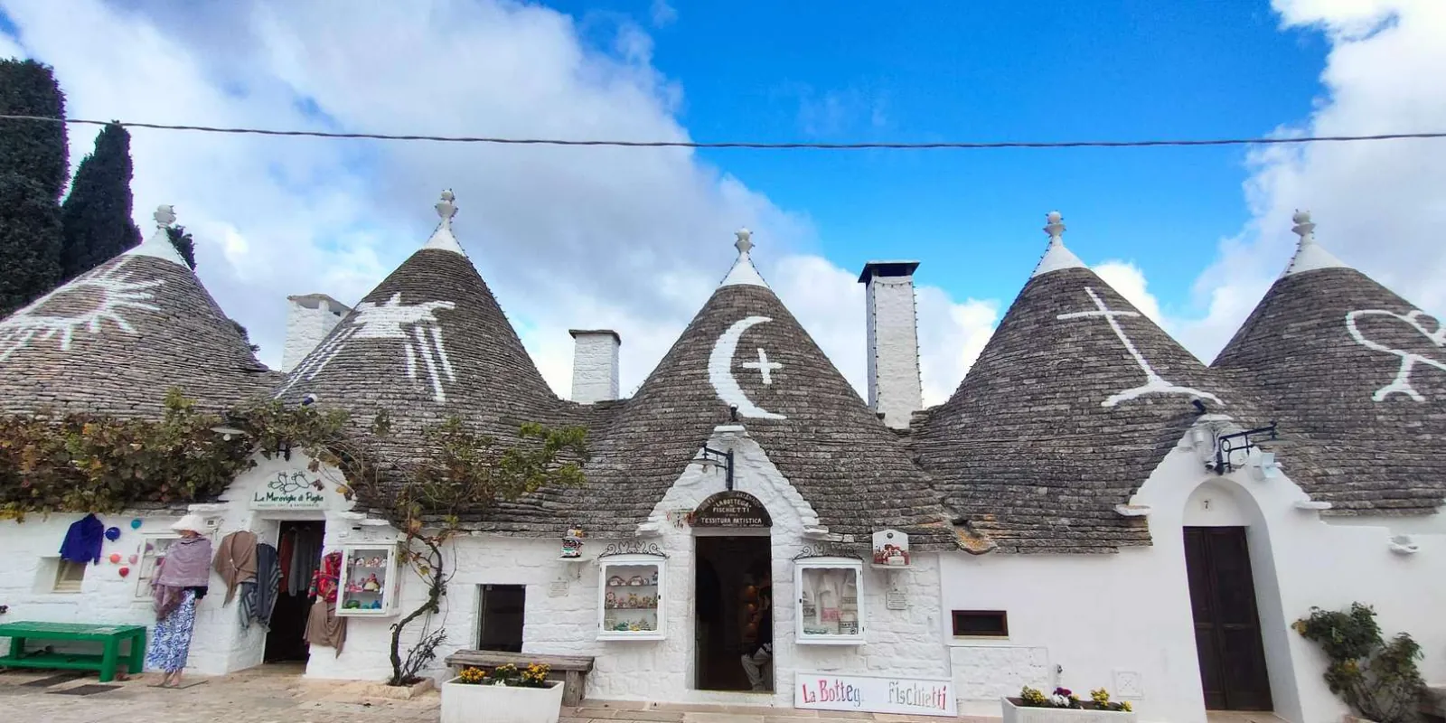Decorative symbols on conical trulli roofs
