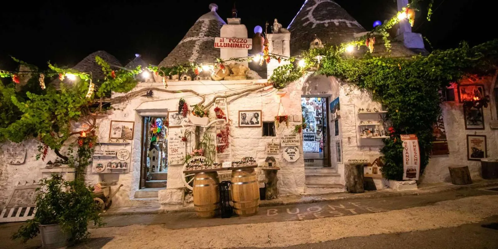 Trulli buildings lit at night