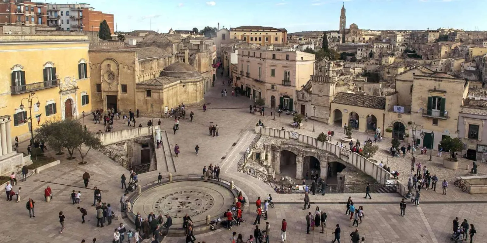 Piazza and historic stone buildings in Matera